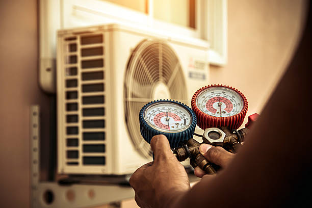 Professional Air Conditioning Service technician working in Yelm, WA